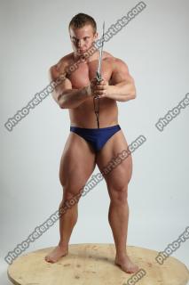 ADAM_WARD STANDING WITH KNIFE